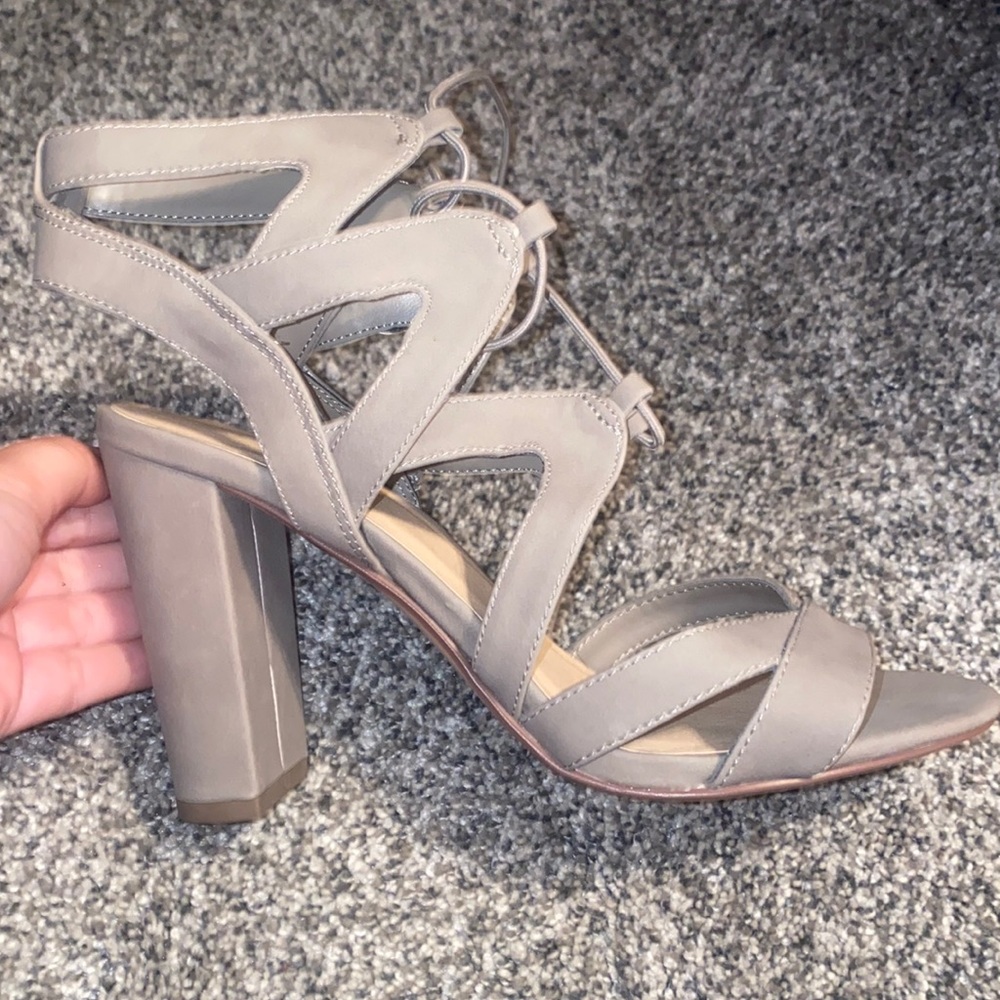 Charlotte Russe lace up heels. Color is taupe/grayish. Never worn.